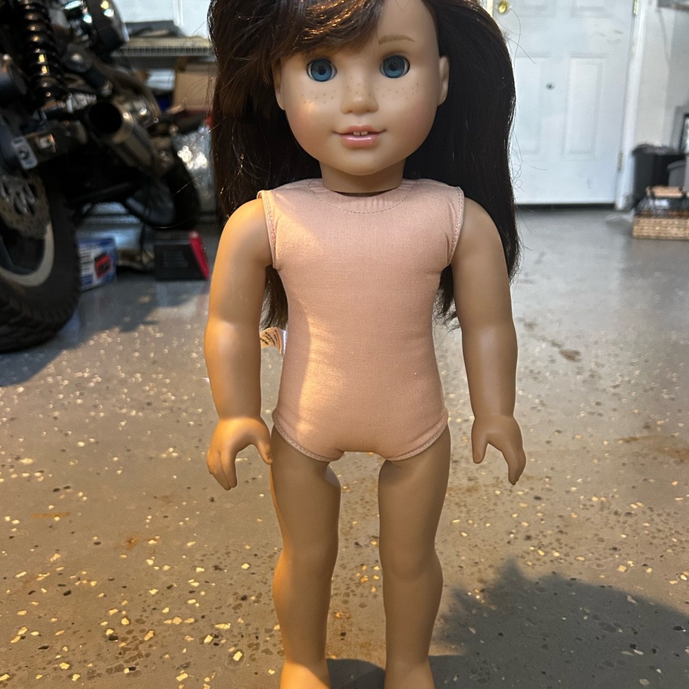 American Girl Doll with Brown Hair and Blue Eyes